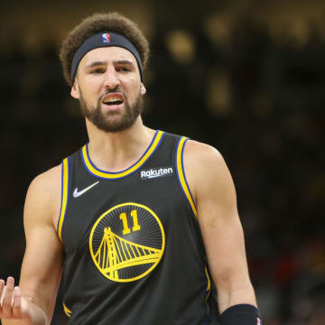 Mar 25, 2022; Atlanta, Georgia, USA; Golden State Warriors guard Klay Thompson (11) shows emotion after a foul call against the Atlanta Hawks in the second half at State Farm Arena. Mandatory Credit: Brett Davis-USA TODAY Sports
