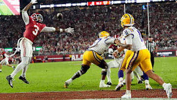 LSU quarterback Michael Van Buren Jr. (11) threads a pass by Alabama defensive back Keon Sabb (3) at Saban Field at Bryant-Denny Stadium. Alabama defeated LSU 20-9. 