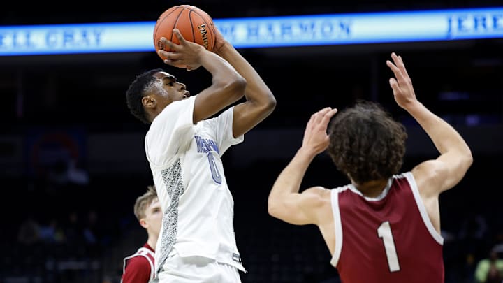 Vashon's Jimmy McKinney III (0) puts up a shot during the Missouri Class 4 state championship game against Benton, Saturday, March 22, 2025, at Mizzou Arena in Columbia, Mo. Vashon defeated Benton, 81-45.