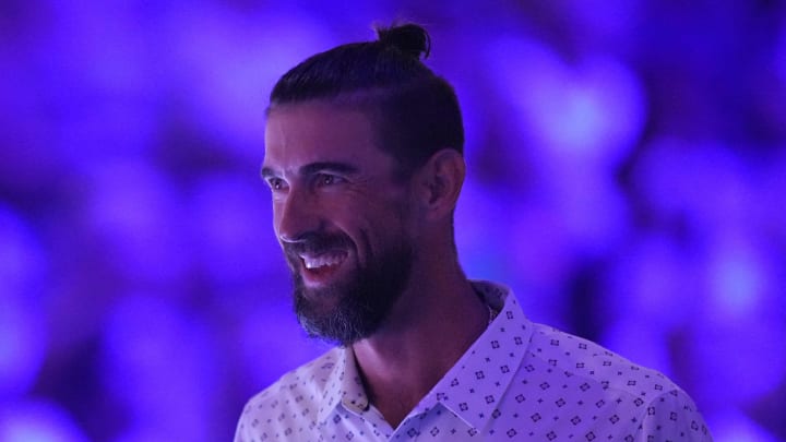 Michael Phelps smiles, Saturday, June 22, 2024, during the eighth day of the U.S. Olympic Team Swimming Trials at Lucas Oil Stadium in Indianapolis.