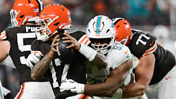 Dec 29, 2024; Cleveland, Ohio, USA; Miami Dolphins defensive tackle Calais Campbell (93) sacks Cleveland Browns quarterback Dorian Thompson-Robinson (17) during the second half at Huntington Bank Field. 