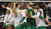 The Oregon volleyball team celebrates a point over Illinois in their first Big Ten matchup of the season.