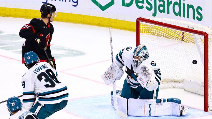 Mar 15, 2026; Ottawa, Ontario, CAN; Ottawa Senators center Ridly Greig (71) watches as a shot by center Dylan Cozens (not pictured) goes past San Jose Sharks goaltender Laurent Broissoit (93) during the third period at Canadian Tire Centre. Mandatory Credit: Keito Newman-Imagn Images


