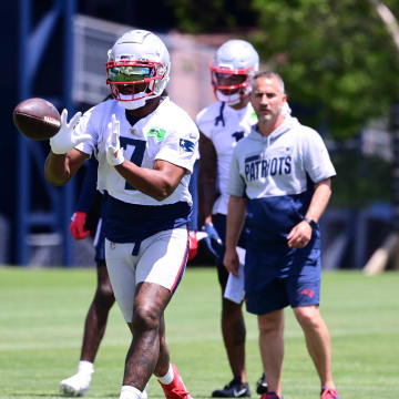 Jun 10, 2024; Foxborough, MA, USA;  New England Patriots wide receiver JuJu Smith-Schuster (7) makes a catch at minicamp at Gillette Stadium. Mandatory Credit: Eric Canha-USA TODAY Sports