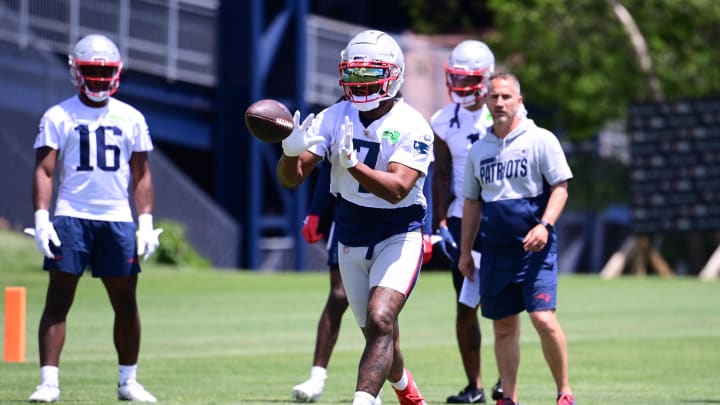 Jun 10, 2024; Foxborough, MA, USA;  New England Patriots wide receiver JuJu Smith-Schuster (7) makes a catch at minicamp at Gillette Stadium. Mandatory Credit: Eric Canha-USA TODAY Sports