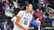 Mar 30, 2025; Spokane, WA, USA; UCLA Bruins center Lauren Betts (51) stretches before a the Elite 8 NCAA Tournament basketball game against the LSU Lady Tigers at Spokane Arena. Mandatory Credit: James Snook-Imagn Images