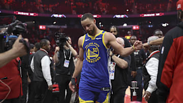 Apr 20, 2025; Houston, Texas, USA; Golden State Warriors guard Stephen Curry (30) walks off the court after the game against the Houston Rockets at Toyota Center. Mandatory Credit: Troy Taormina-Imagn Images