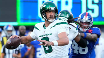 Aug 26, 2023; East Rutherford, New Jersey, USA;   New York Jets quarterback Aaron Rodgers (8) throws against the Giants at MetLife Stadium. Mandatory Credit: Robert Deutsch-Imagn Images