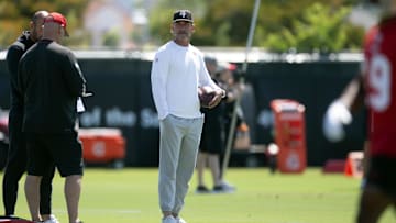 Jun 10, 2025; Santa Clara, CA, USA; San Francisco 49ers head coach Kyle Shanahan watches his players work out during an OTA at Levi's Stadium.