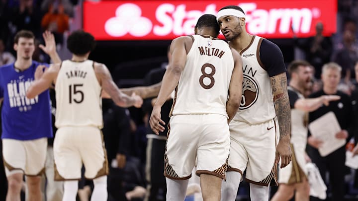 Feb 9, 2026; San Francisco, California, USA; Golden State Warriors forward/center De'Anthony Melton (8) celebrates with guard Gary Payton II (0) as a timeout is called against the Memphis Grizzlies during the fourth quarter at Chase Center. Mandatory Credit: Kelley L Cox-Imagn Images