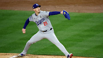 Oct 28, 2024; New York, New York, USA; Los Angeles Dodgers pitcher Walker Buehler (21) throws during the first inning in game three of the 2024 MLB World Series against the New York Yankees at Yankee Stadium. Mandatory Credit: Vincent Carchietta-Imagn Images