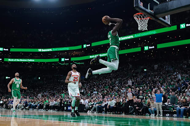 Boston Celtics guard Jaylen Brown (7) drives to the basket against the New York Knicks in the second quarter at TD Garden.