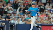 Aug 3, 2025; Miami, Florida, USA; Miami Marlins left fielder Kyle Stowers (28) circles the bases after hitting a three-run home run against the New York Yankees during the fourth inning at loanDepot Park. Mandatory Credit: Sam Navarro-Imagn Images
