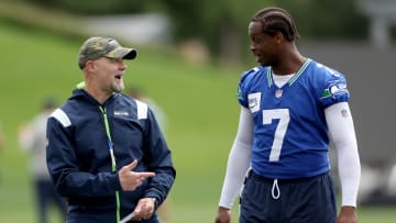 Geno Smith and Ryan Grubb of the Seattle Seahawks