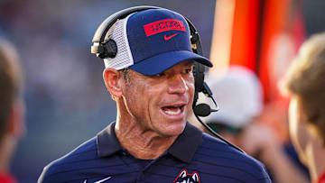 Sep 20, 2025; East Hartford, Connecticut, USA; Connecticut Huskies head coach Jim Mora watches from the sideline as they take on the Ball State Cardinals at Pratt & Whitney Stadium at Rentschler Field. Mandatory Credit: David Butler II-Imagn Images
