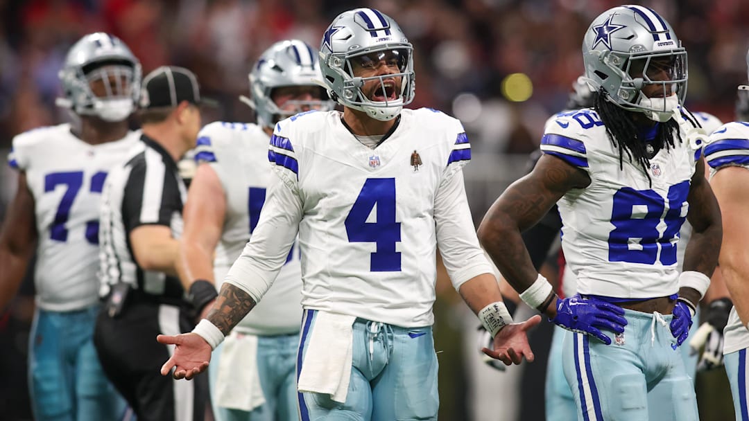 Dallas Cowboys quarterback Dak Prescott (4) reacts to a penalty against the Atlanta Falcons in the third quarter at Mercedes-Benz Stadium.