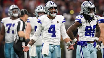 Dallas Cowboys quarterback Dak Prescott (4) reacts to a penalty against the Atlanta Falcons in the third quarter at Mercedes-Benz Stadium.