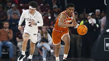Mar 4, 2025; Starkville, Mississippi, USA; Texas Longhorns guard Julian Larry (1) dribbles during the first half against the Mississippi State Bulldogs at Humphrey Coliseum. Mandatory Credit: Petre Thomas-Imagn Images