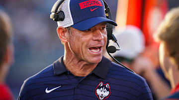 Sep 20, 2025; East Hartford, Connecticut, USA; Connecticut Huskies head coach Jim Mora watches from the sideline as they take on the Ball State Cardinals at Pratt & Whitney Stadium at Rentschler Field. Mandatory Credit: David Butler II-Imagn Images