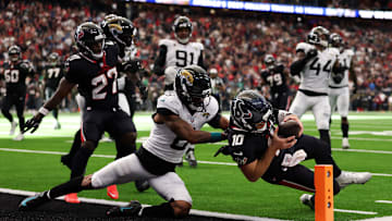 Davis Mills dives for the pylon to put the Houston Texans ahead in the final minute against the Jacksonville Jaguars