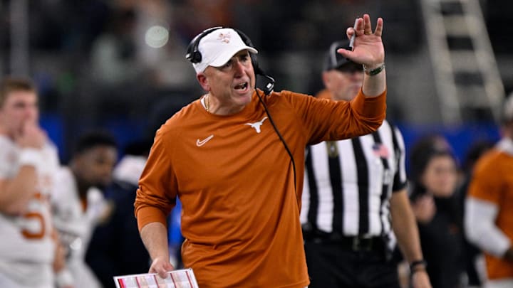 Jan 10, 2025; Arlington, TX, USA; Texas Longhorns offensive coordinator Kyle Flood during the game between the Texas Longhorns and the Ohio State Buckeyes at AT&T Stadium. Mandatory Credit: Jerome Miron-Imagn Images