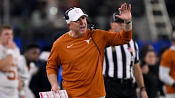 Jan 10, 2025; Arlington, TX, USA; Texas Longhorns offensive coordinator Kyle Flood during the game between the Texas Longhorns and the Ohio State Buckeyes at AT&T Stadium. Mandatory Credit: Jerome Miron-Imagn Images