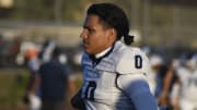 Granite Hills quarterback Zach Benitez prepares for Friday's season opener at Mission Hills