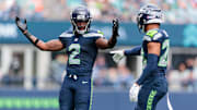 Sep 22, 2024; Seattle, Washington, USA; Seattle Seahawks safety Rayshawn Jenkins (2) celebrates during the second quarter against Miami Dolphins at Lumen Field. Mandatory Credit: Kevin Ng-Imagn Images