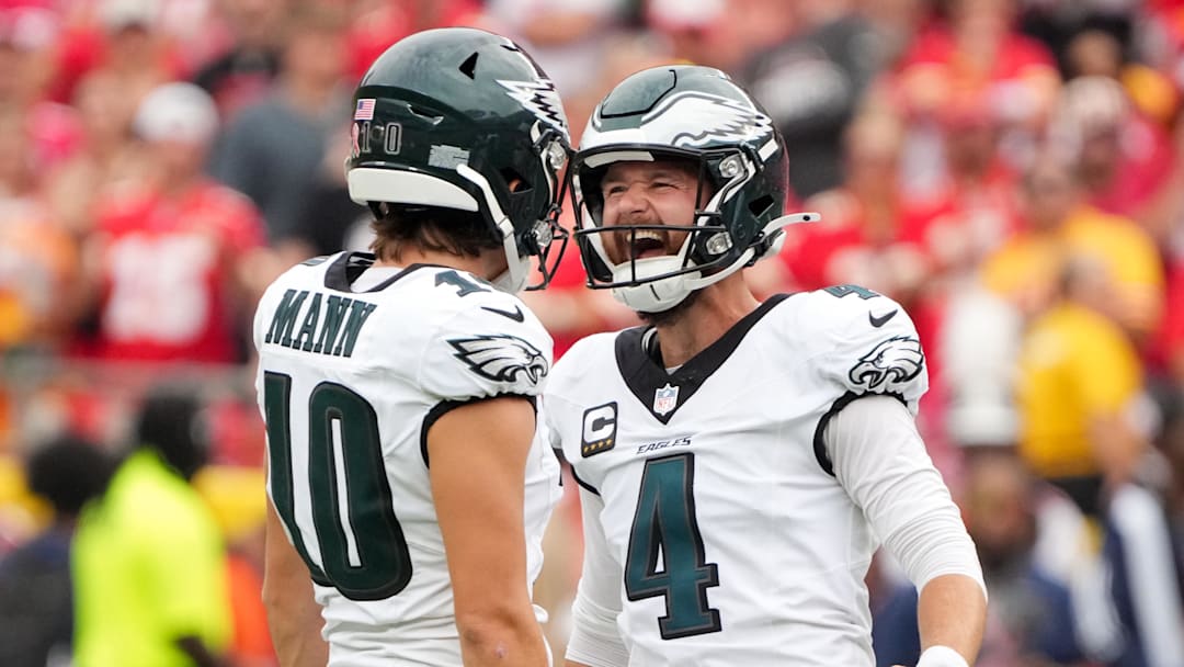 Sep 14, 2025; Kansas City, Missouri, USA; Philadelphia Eagles punter Braden Mann (10) and place kicker Jake Elliott (4) celebrate a field goal against the Kansas City Chiefs during the second quarter of the game at GEHA Field at Arrowhead Stadium. Mandatory Credit: Denny Medley-Imagn Images