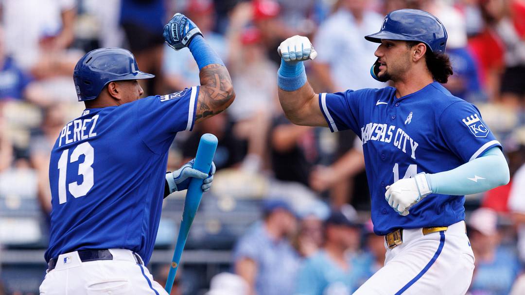 Jun 21, 2026; Kansas City, Missouri, USA; Kansas City Royals right fielder Jac Caglianone (14) hits elbows with Kansas City Royals catcher Salvador Perez (13) after hitting a home run during the ninth inning against the St. Louis Cardinals at Kauffman Stadium. Mandatory Credit: William Purnell-Imagn Images