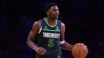 Apr 30, 2025; Los Angeles, California, USA; Minnesota Timberwolves guard Anthony Edwards (5) moves the ball against the Los Angeles Lakers during the second half in game five of first round for the 2025 NBA Playoffs at Crypto.com Arena. Mandatory Credit: Gary A. Vasquez-Imagn Images