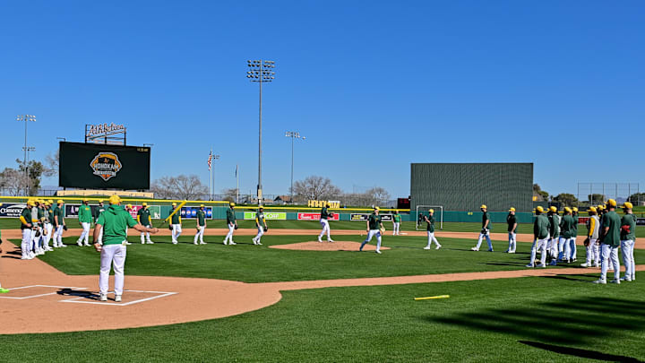 Feb 16, 2024; Mesa, AZ, USA; Oakland Athletics players run a drill during a Spring Training workout