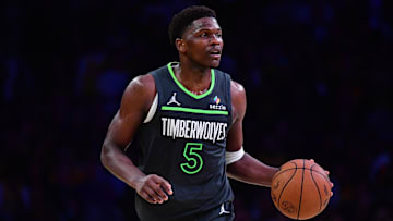 Apr 30, 2025; Los Angeles, California, USA; Minnesota Timberwolves guard Anthony Edwards (5) moves the ball against the Los Angeles Lakers during the second half in game five of first round for the 2025 NBA Playoffs at Crypto.com Arena. Mandatory Credit: Gary A. Vasquez-Imagn Images