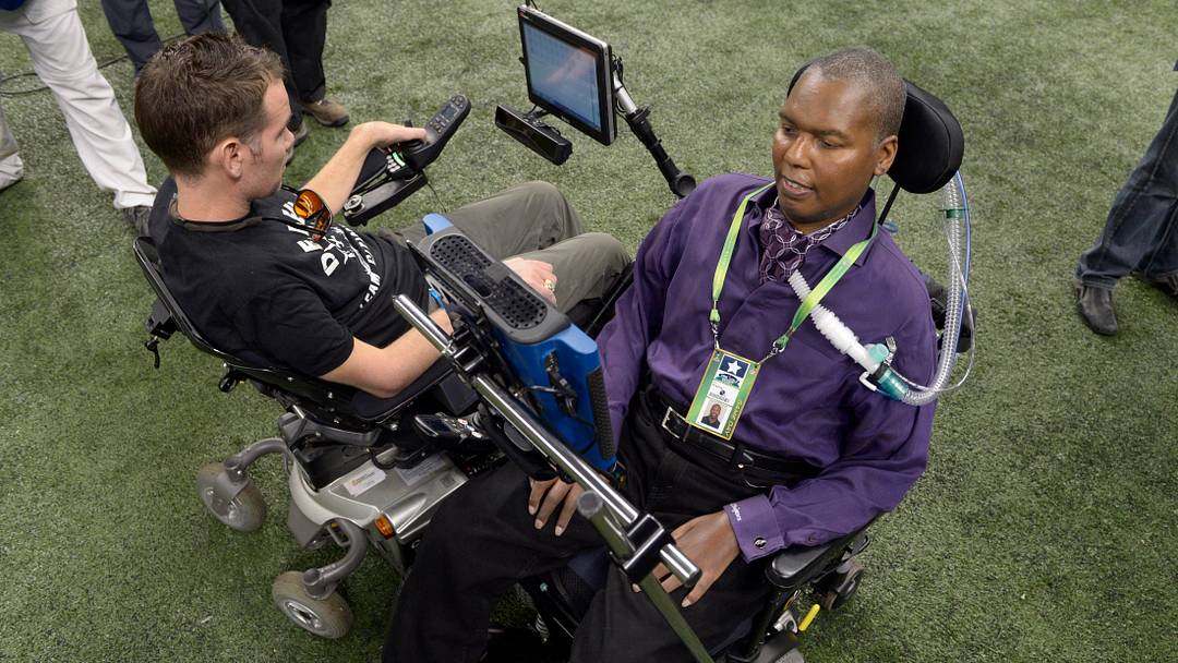 Feb 3, 2013; New Orleans, LA, USA; Baltimore Ravens former player O.J. Brigance (right) and New Orleans Saints former player Steve Gleason (left) attend Super Bowl XLVII between the San Francisco 49ers and the Baltimore Ravens at the Mercedes-Benz Superdome. Mandatory Credit: John David Mercer-USA TODAY Sports