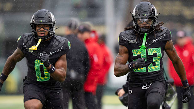 Oregon Ducks dan lanning schedule Dante moore Tradarian Ball LaMarcus Bell Dierre Hill Jr. Recruiting Big Ten Utah Utes NIL 