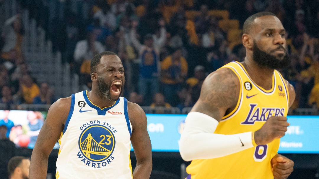 Golden State Warriors forward Draymond Green (23) celebrates against Los Angeles Lakers forward LeBron James (6) Golden State Warriors forward Draymond Green (23) celebrates against Los Angeles Lakers forward LeBron James (6)