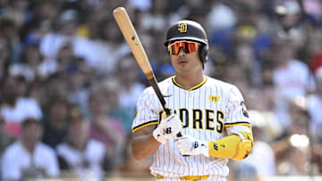 Jul 10, 2024; San Diego, California, USA; San Diego Padres shortstop Ha-Seong Kim (7) bats during the second inning against the Seattle Mariners at Petco Park. Mandatory Credit: Orlando Ramirez-Imagn Images
