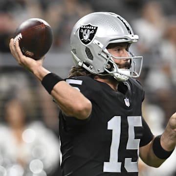 Aug 17, 2024; Paradise, Nevada, USA; Las Vegas Raiders quarterback Gardner Minshew (15) looks to make a pass Dallas Cowboys in the first quarter at Allegiant Stadium. Mandatory Credit: Candice Ward-Imagn Images