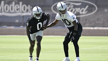 Jun 11, 2025; Henderson, NV, USA; Las Vegas Raiders cornerback Jakorian Bennett (0) and wide receiver Dont'e Thornton Jr. (10) run through a drill during Las Vegas Raiders Minicamp at Intermountain Health Performance Center. Mandatory Credit: Candice Ward-Imagn Images