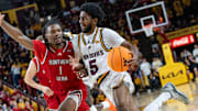 Arizona State Sun Devils Moe Odum (5) runs with the ball against Southern Utah Thunderbirds Elijah Duval (1) during a game at Desert Financial Arena in Tempe on Nov. 4, 2025.