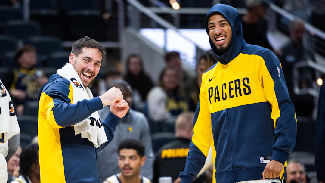 Indiana Pacers guards T.J. McConnell (9) and Tyrese Haliburton (0)