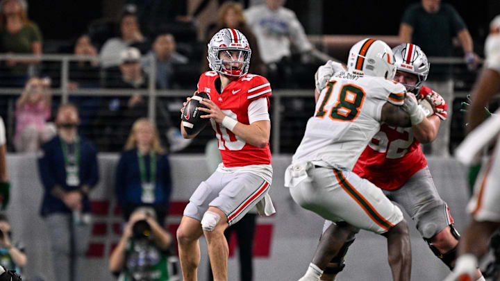 Dec 31, 2025; Arlington, TX, USA; Ohio State Buckeyes quarterback Julian Sayin (10) throws the ball during the 2025 Cotton Bowl and quarterfinal game of the College Football Playoff at AT&T Stadium. Mandatory Credit: Jerome Miron-Imagn Images
