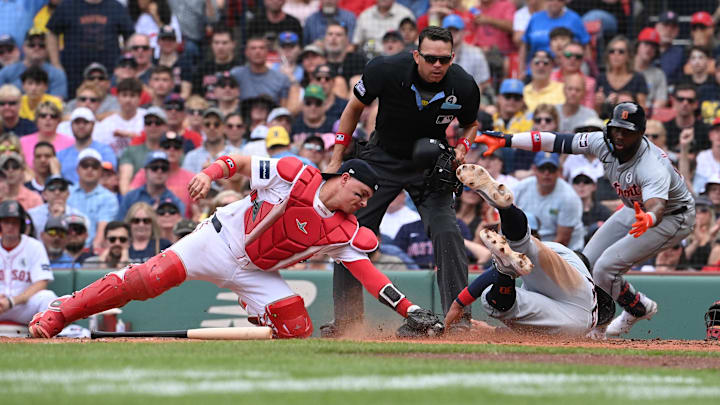 Jun 2, 2024; Boston, Massachusetts, USA; Detroit Tigers right fielder Wenceel Perez (46) slides safe into home plate covered by Boston Red Sox catcher Reese McGuire (3) during the sixth inning at Fenway Park. Jun 2, 2024; Boston, Massachusetts, USA; Detroit Tigers right fielder Wenceel Perez (46) slides safe into home plate covered by Boston Red Sox catcher Reese McGuire (3) during the sixth inning at Fenway Park.