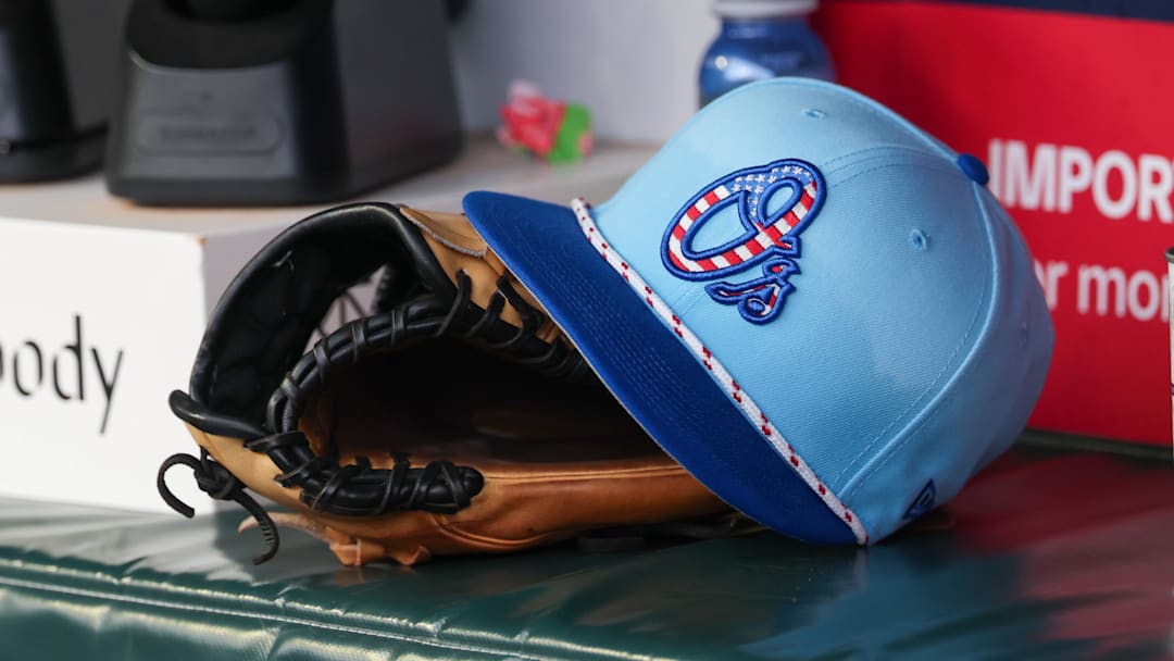 Jul 4, 2025; Atlanta, Georgia, USA; A detailed view of the Baltimore Orioles 4th of July hat in the dugout against the Atlanta Braves in the third inning at Truist Park. 