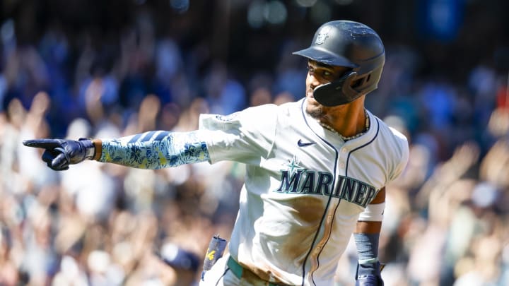 Seattle Mariners center fielder Julio Rodriguez (44) points back to the dugout after hitting a two-run home run against the Tampa Bay Rays during the fifth inning at T-Mobile Park on Aug 27.