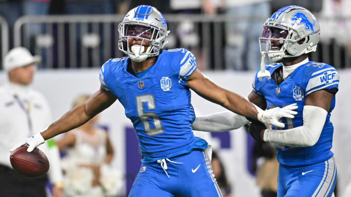 Dec 24, 2023; Minneapolis, Minnesota, USA; Detroit Lions safety Ifeatu Melifonwu (6) reacts after an interception with safety Kerby Joseph (31) against the Minnesota Vikings during the game at U.S. Bank Stadium. Mandatory Credit: Jeffrey Becker-USA TODAY Sports