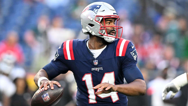 Aug 15, 2024; Foxborough, Massachusetts, USA; New England Patriots quarterback Jacoby Brissett (14) looks to pass against the Philadelphia Eagles during the first half at Gillette Stadium. Mandatory Credit: Brian Fluharty-USA TODAY Sports