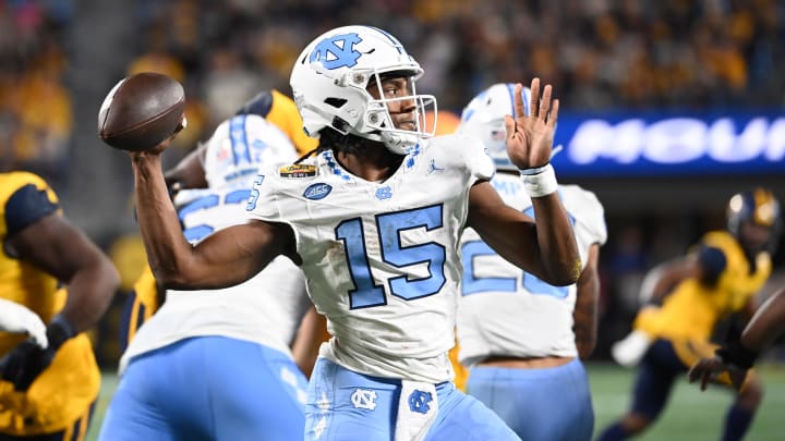 Dec 27, 2023; Charlotte, NC, USA; North Carolina Tar Heels quarterback Conner Harrell (15) looks to pass in the third quarter at Bank of America Stadium. Mandatory Credit: Bob Donnan-USA TODAY Sports