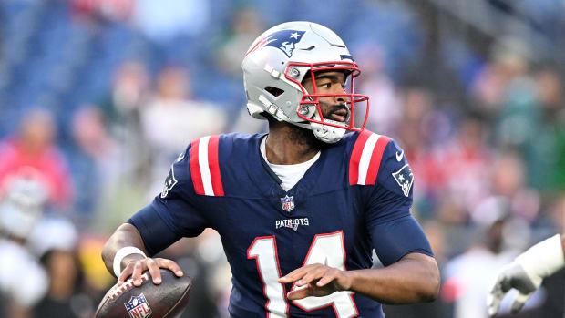 New England Patriots quarterback Jacoby Brissett (14) looks to pass against the Philadelphia Eagles during the first half.