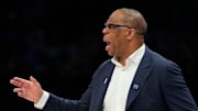 Mar 14, 2025; Charlotte, NC, USA; North Carolina Tar Heels head coach Hubert Davis reacts in the first half at Spectrum Center. 